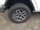 2025 Jeep Wrangler Sahara White vin: 1C4PJXEN2SW573460 Damage: Right Rear Wheel, Curb Rash, 9 To 10 Inches