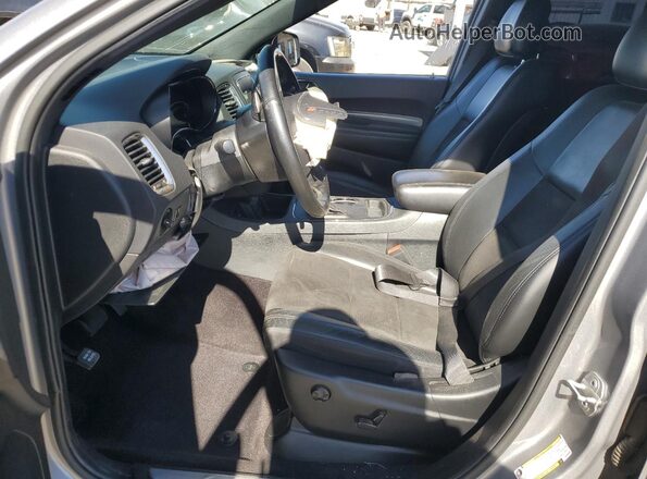 1C4RDJDGXKC559999 2019 DODGE DURANGO Серебряный Вид салона спереди
