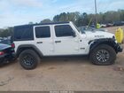 2025 Jeep Wrangler 4-door Willys 4x4 White vin: 1C4RJXDG3SW557666