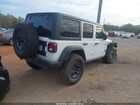 2025 Jeep Wrangler 4-door Willys 4x4 White vin: 1C4RJXDG3SW557666