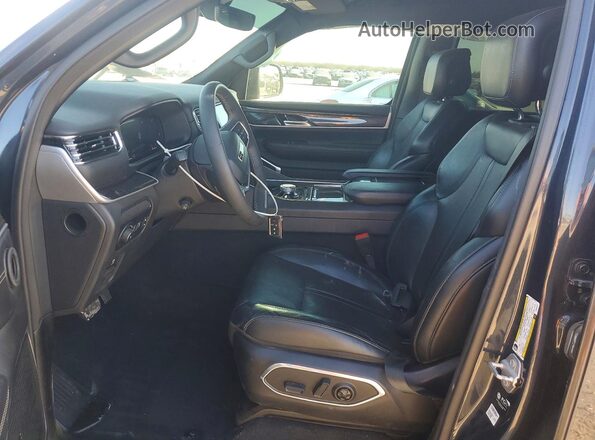 1C4SJSAP8PS569321 2023 JEEP WAGONEER Charcoal Front interior view