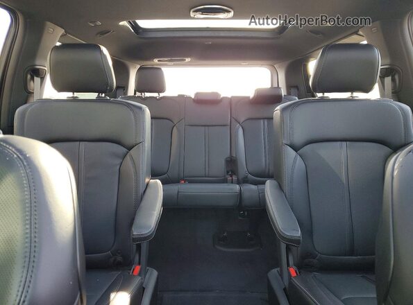 1C4SJUAP3TS153165 2026 JEEP GRAND Teal Vista de los asientos traseros