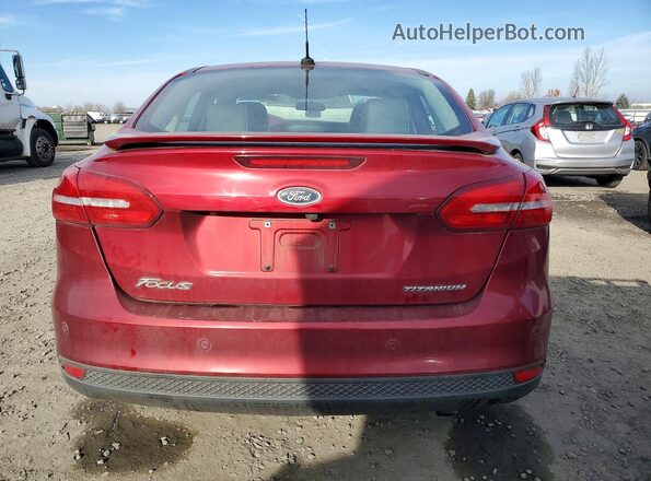 1FADP3J27GL337519 2016 FORD FOCUS Бордовый Вид сзади