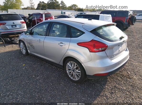 1FADP3N23GL326561 2016 FORD FOCUS Silver Trasero izquierdo