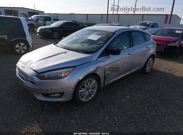 1FADP3N23GL326561 2016 FORD FOCUS Silver Vista tres cuartos delantera izquierda