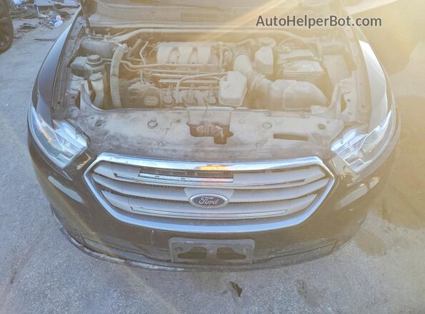 1FAHP2D89GG121952 2016 FORD TAURUS Черный Вид задней части салона