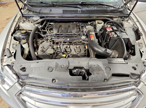 1FAHP2F87JG102174 2018 FORD TAURUS Серебряный Вид задней части салона