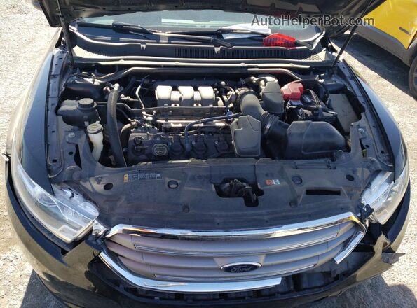 1FAHP2H84GG107452 2016 FORD TAURUS Черный Вид задней части салона