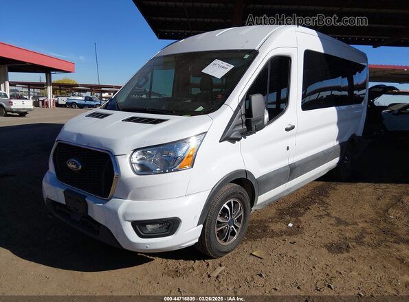 1FBAX2CG5NKA49604 2022 FORD PASSENGER White Vista tres cuartos delantera izquierda