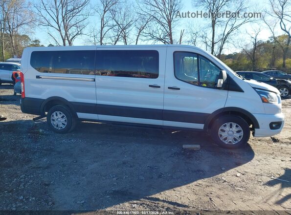 1FBAX2YG9PKA94248 2023 FORD PASSENGER White Widok wnętrza z tyłu