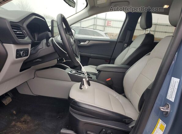 1FMCU0E18RUB13022 2024 FORD ESCAPE Синий Вид салона спереди