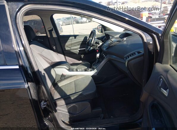 1FMCU0G79GUB82865 2016 FORD ESCAPE Черный Вид салона спереди