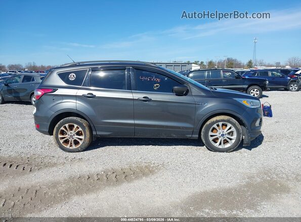 1FMCU9GD2HUC55263 2017 FORD ESCAPE Серый Вид задней части салона