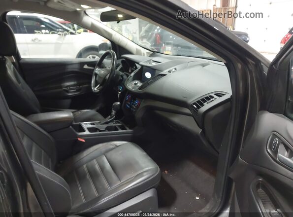 1FMCU9GD4HUD02695 2017 FORD ESCAPE Gray Вид салону спереду
