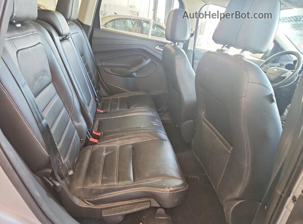 1FMCU9J93HUA69946 2017 FORD ESCAPE Silver Vista de los asientos traseros