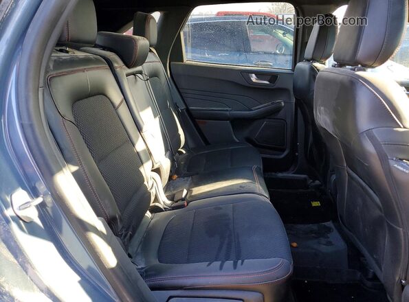1FMCU9MN2RUA63145 2024 FORD ESCAPE Серый Вид задней части салона