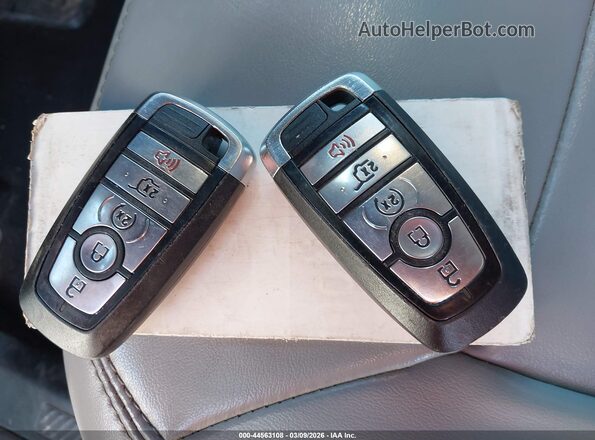 1FMSK7DH6MGA61065 2021 FORD FORD EXPLORER White Widok deski rozdzielczej
