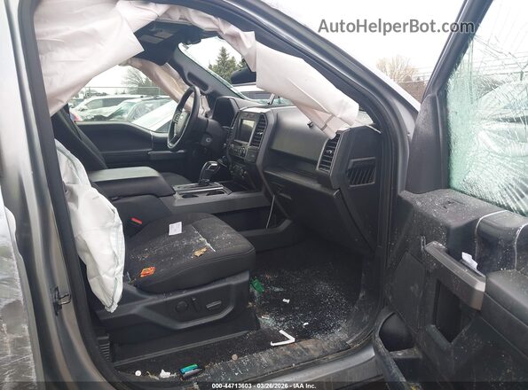 1FTEW1E45LFB07276 2020 FORD F150 Серебряный Вид салона спереди