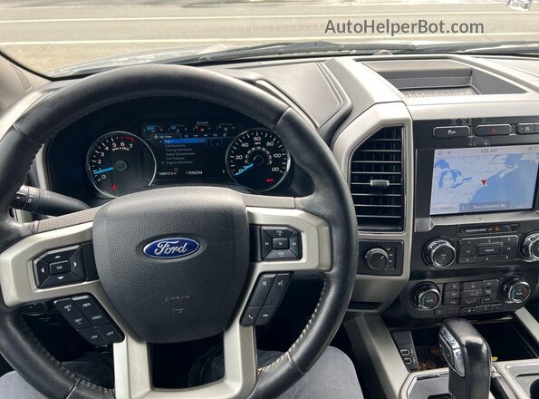 1FTEW1E57LFA23744 2020 FORD F150 Серебряный Вид салона спереди