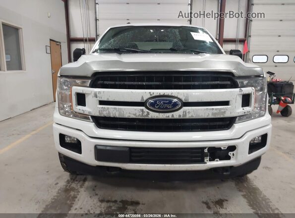 1FTEW1EPXJFC83022 2018 FORD F150 Белый Вид щитка приборов