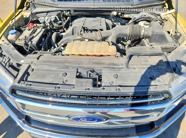 1FTEX1EP8JKE87712 2018 FORD F150 Желтый Вид задней части салона