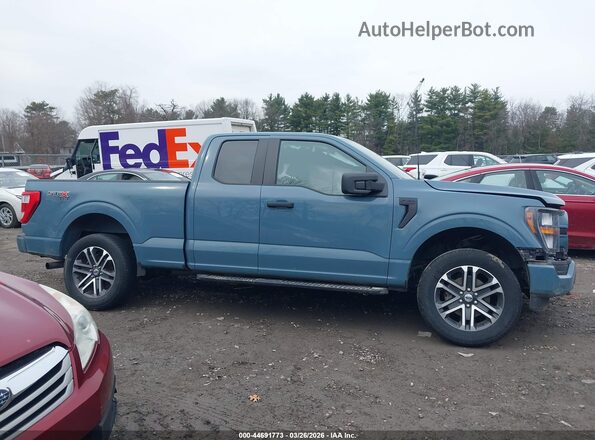 1FTEX1EP9PKD71010 2023 FORD F150 Синий Вид задней части салона