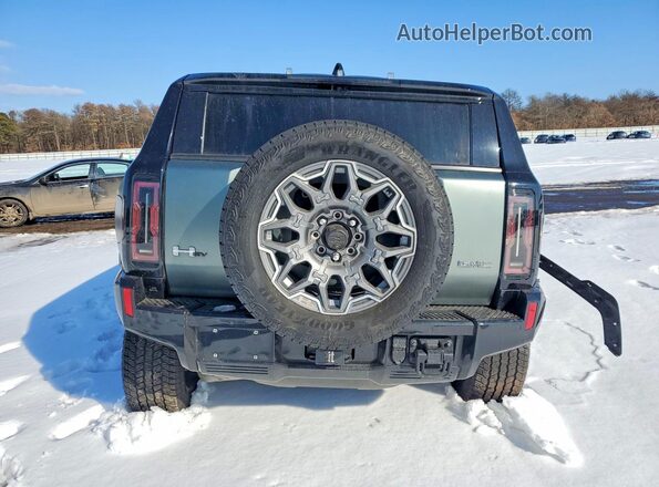 1GKB0RDC5RU100204 2024 GMC HUMMER Зеленый Вид сзади