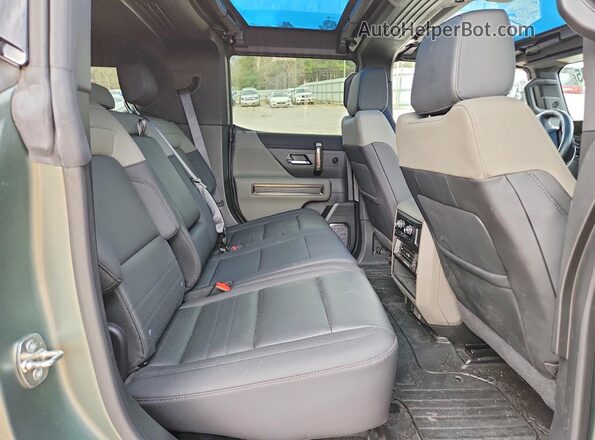 1GKB0RDC6RU102303 2024 GMC HUMMER Зеленый Вид задней части салона