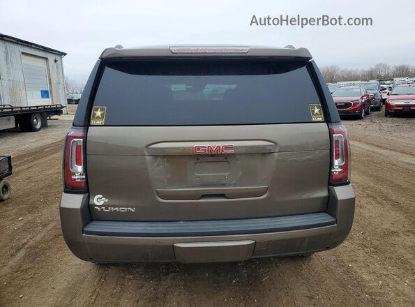 1GKS2AKC7GR210654 2016 GMC YUKON Tan Vista trasera