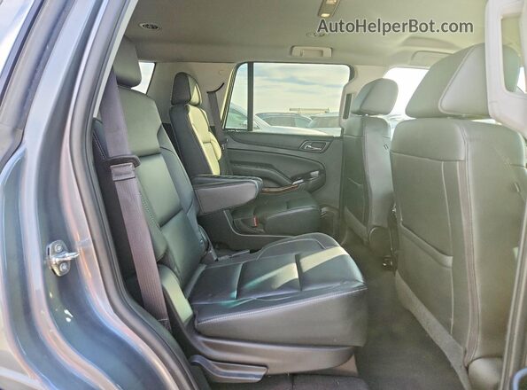1GNSCBKC0KR257068 2019 CHEVROLET TAHOE Серый Вид задней части салона