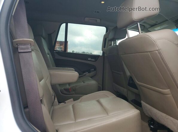 1GNSCBKC4KR285049 2019 CHEVROLET TAHOE White Widok wnętrza z tyłu