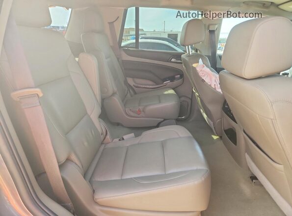 1GNSCBKC5JR282594 2018 CHEVROLET TAHOE Gray Widok wnętrza z tyłu