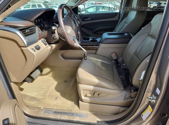 1GNSCBKC5JR282594 2018 CHEVROLET TAHOE Gray Widok wnętrza z przodu