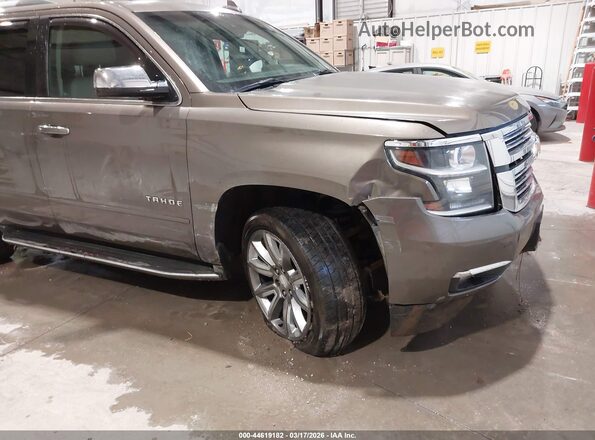 1GNSKCKC7GR180327 2016 CHEVROLET TAHOE Коричневый Вид спереди
