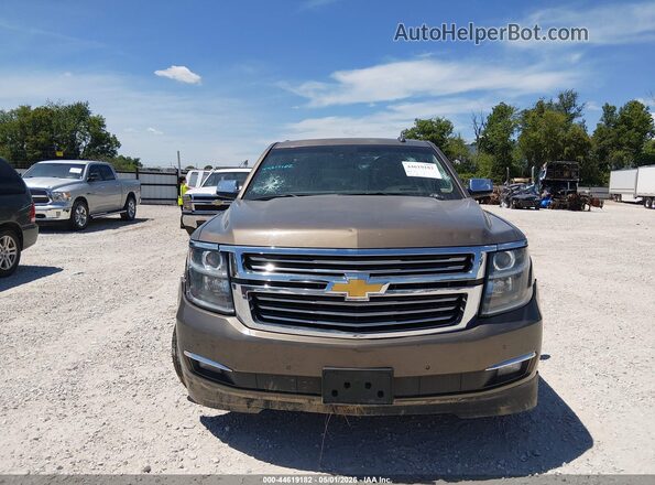 1GNSKCKC7GR180327 2016 CHEVROLET TAHOE Коричневый Вид задней части салона