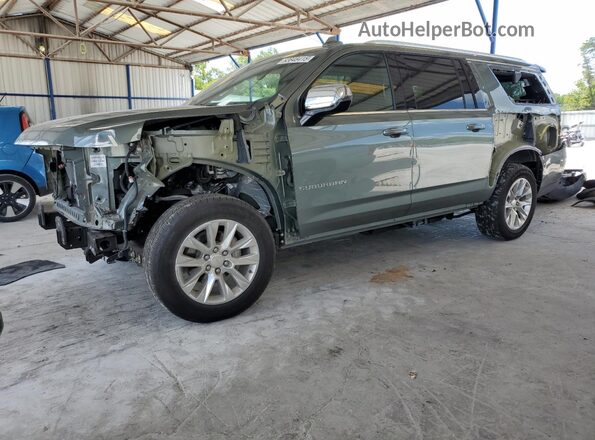 1GNSKFKD0PR276231 2023 CHEVROLET SUBURBAN Green წინა მარცხენა ხედი სამი მეოთხედიდან