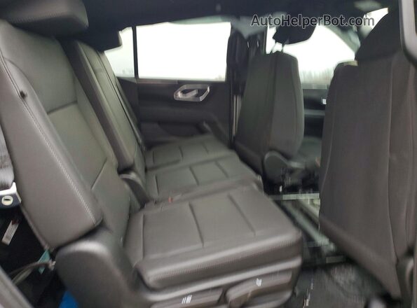 1GNSKLED1RR209943 2024 CHEVROLET TAHOE Silver Вид задньої частини салону