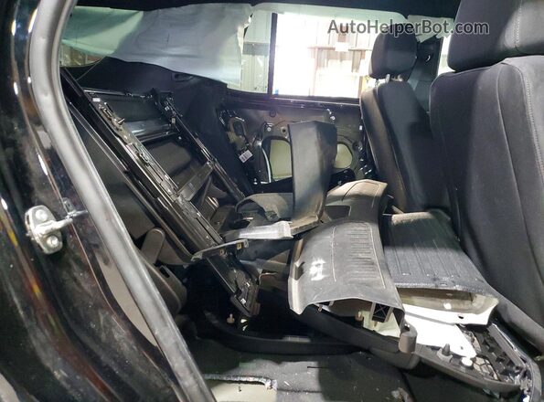 1GNSKLEDXPR471621 2023 CHEVROLET TAHOE Black Вид задньої частини салону