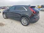 2022 Cadillac Xt4 Luxury Черный vin: 1GYAZAR49NF143808
