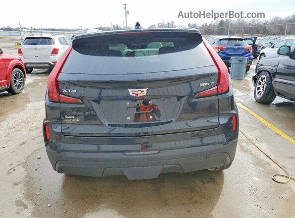 1GYFZBR44RF199057 2024 CADILLAC XT4 Черный Вид сзади