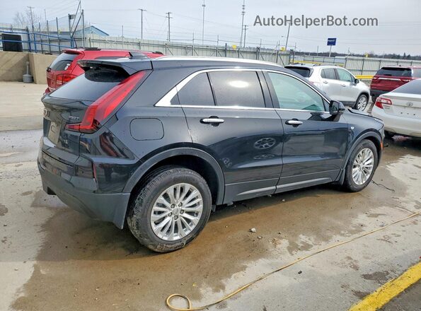 1GYFZBR44RF199057 2024 CADILLAC XT4 Черный Задняя правая четверть