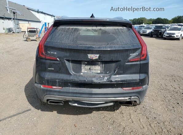1GYFZDR43NF141060 2022 CADILLAC XT4 Черный Вид сзади