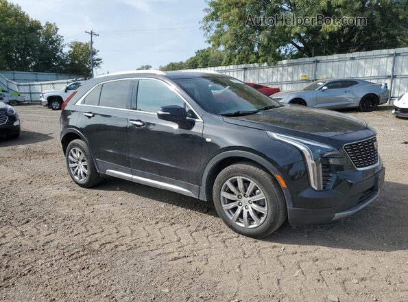 1GYFZDR43NF141060 2022 CADILLAC XT4 Черный Передняя правая четверть