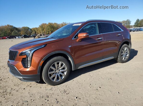 1GYFZDR48MF003724 2021 CADILLAC XT4 Orange წინა მარცხენა ხედი სამი მეოთხედიდან