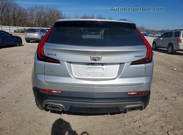 1GYFZDR48NF110029 2022 CADILLAC XT4 Серебряный Вид сзади