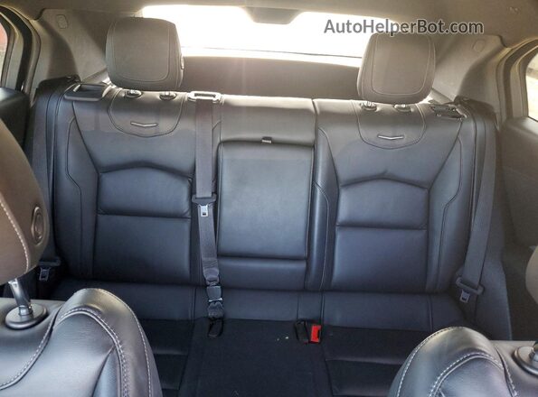 1GYFZDR48NF110029 2022 CADILLAC XT4 Серебряный Вид задних сидений