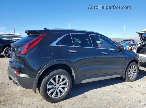 1GYFZDR4XNF131075 2022 CADILLAC XT4 Черный Задняя правая четверть