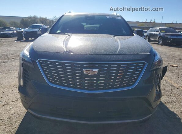 1GYFZDR4XNF131075 2022 CADILLAC XT4 Черный Вид спереди