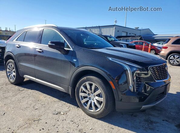 1GYFZDR4XNF131075 2022 CADILLAC XT4 Черный Передняя правая четверть