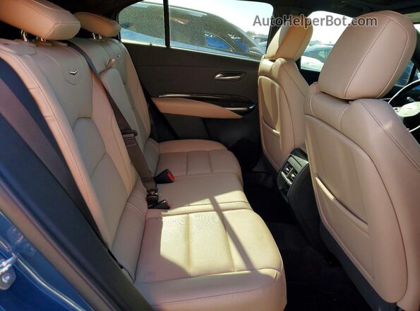 1GYFZDR4XSF154223 2025 CADILLAC XT4 Blue Vista interior trasera
